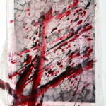 Photograph of a splash of paint printed using photopolymer on rice paper, mounted on a photopolymer print of dry soil on cotton paper, and direct ink drawing, 